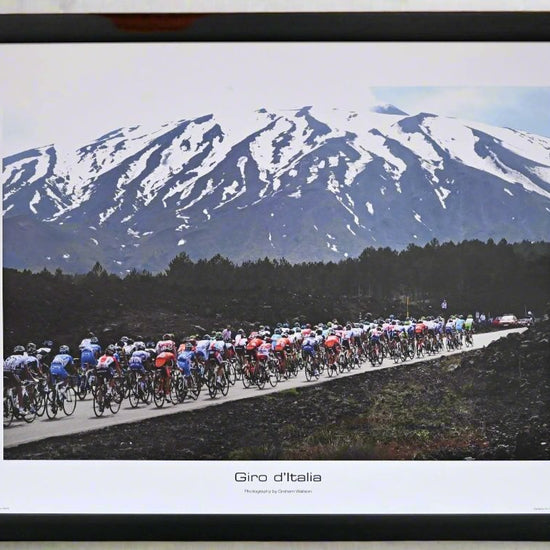 The peloton of the 2011 Giro d'Italia climb towards Mount Etna - Europe's highest active volcano.