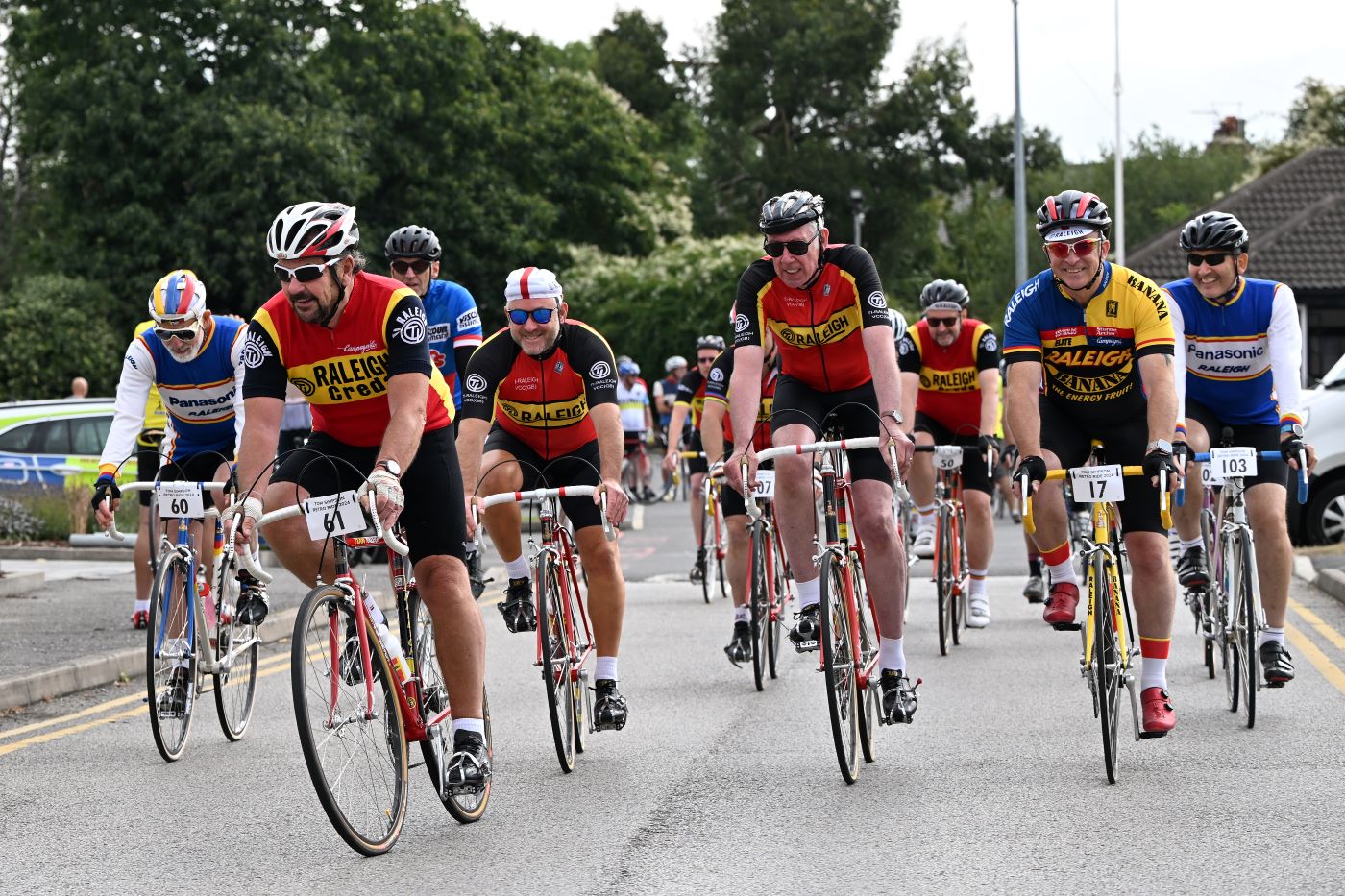Riders wearing retro style cycling gear and riding vintage bikes leave the start area for the Tom Simpson Retro Ride - part of the Simpson Retro Cycling Festival in Harworth, Nottinghamshire.