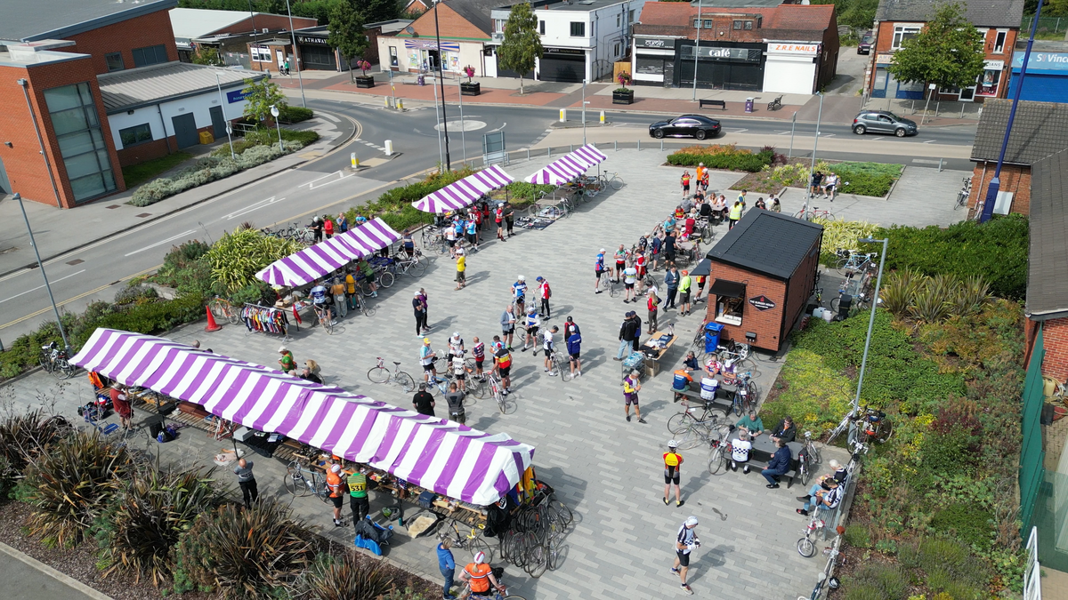 Drone shot showing the event village and market stands at the Simpson Retro.