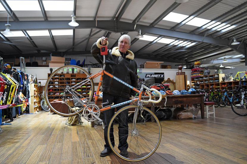 Image of Keith Lambert weighing a Holdsworth bike