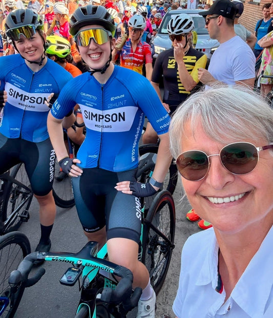 Joanne Simpson, daughter of cycling legend Tom Simpson, at the start line with Erin Avill and Amelia Sykes - part of the 2025 Simpson Nouvelles Cycling Team