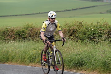 Gary Fairley - producers of the Cycling Legends Podcast - riding a road bike. 