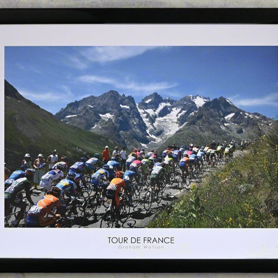 The Peloton climb the Col du Galibier. Towered over by the great Melie Glacier. 