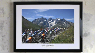The Peloton climb the Col du Galibier. Towered over by the great Melie Glacier. 