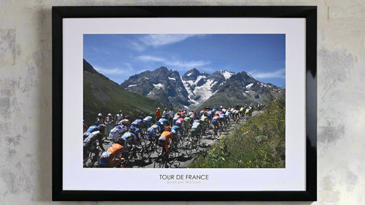 The Peloton climb the Col du Galibier. Towered over by the great Melie Glacier. 