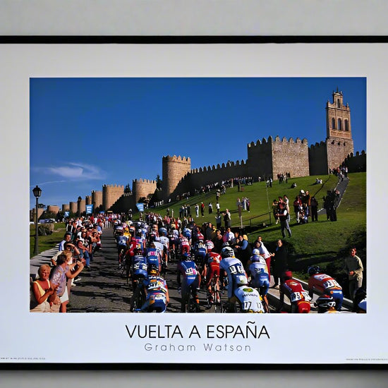 2002 Vuelta A Espana. The peloton climbs into the walled city of Avila, Spain.